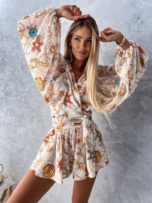 Bohemian V-Neck Wrap Jumpsuit with Flowing Sleeves and Tropical Elegance