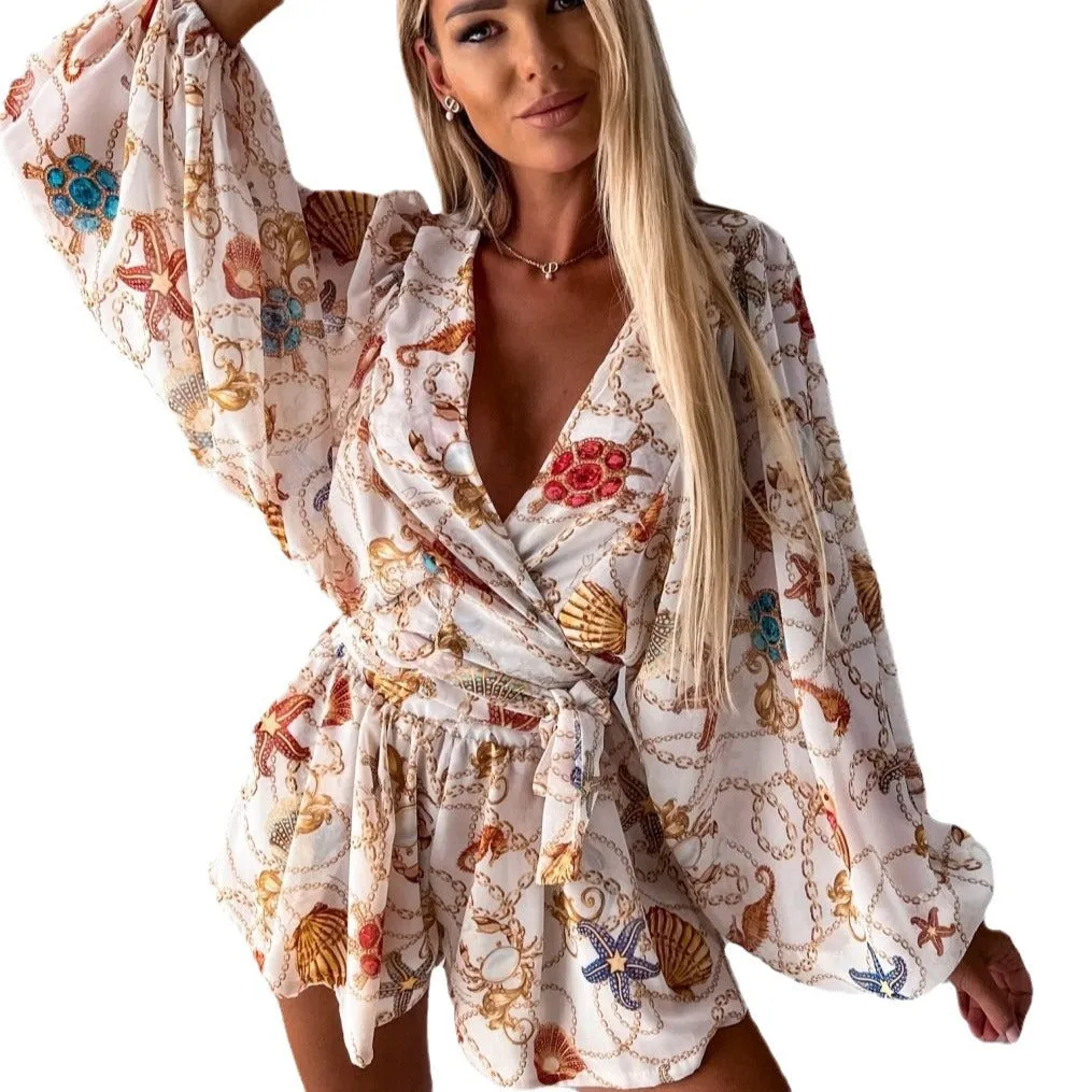 Bohemian V-Neck Wrap Jumpsuit with Flowing Sleeves and Tropical Elegance