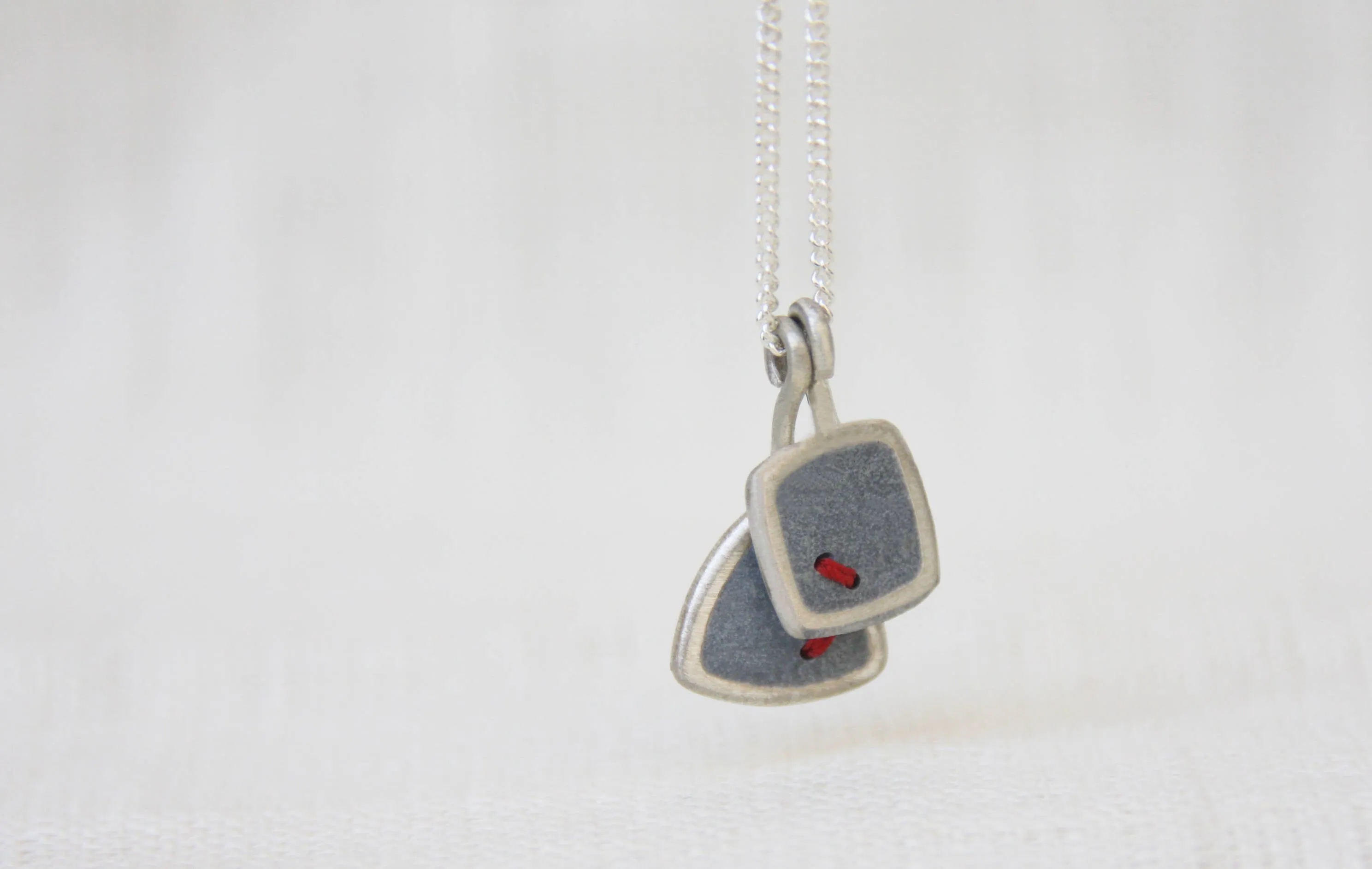 Casual Double gold and concrete pendents