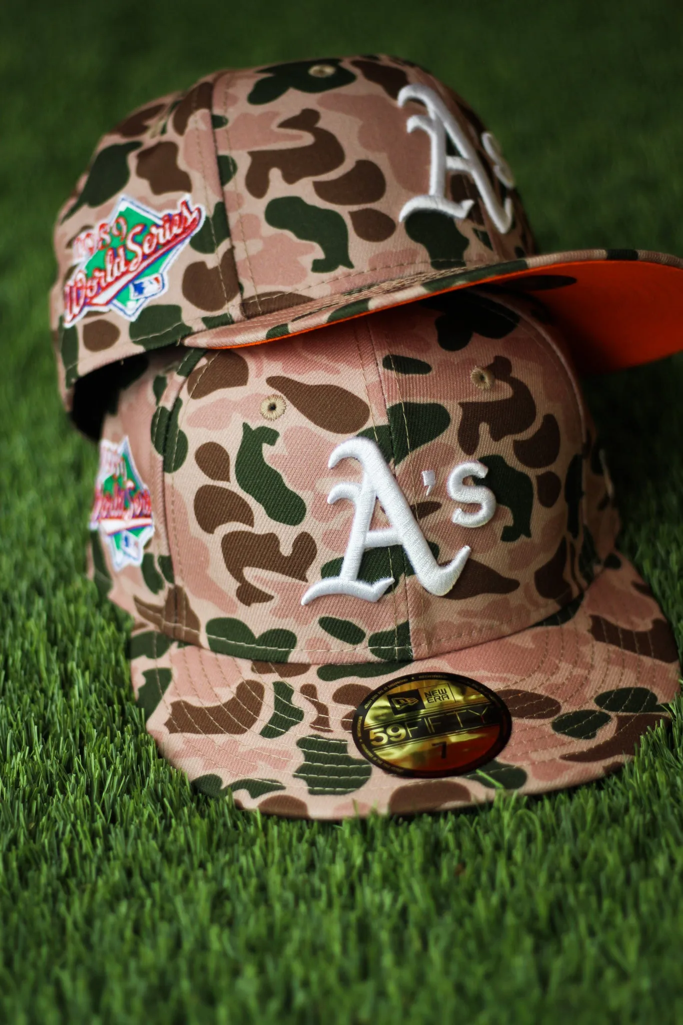 OAKLAND ATHLETICS DUCK CAMO FITTED W/ ORANGE UNDER VISOR