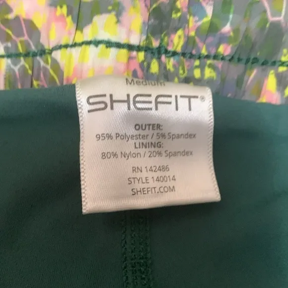 SheFit 2 in 1 Running Shorts Green Conquer and Print Size M NWT