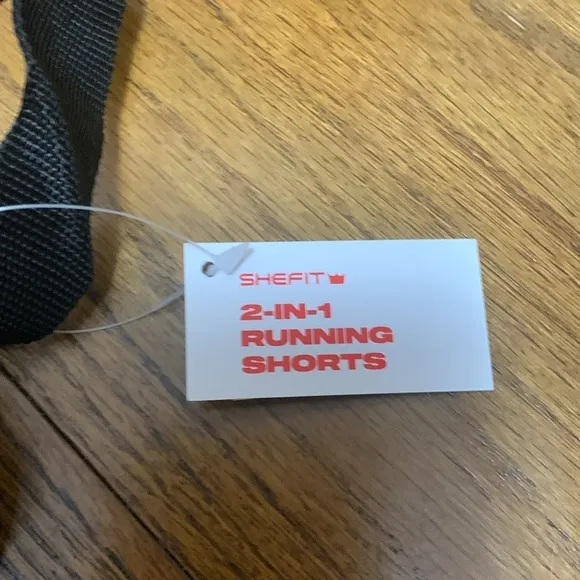 SheFit 2 in 1 Running Shorts Green Conquer and Print Size M NWT